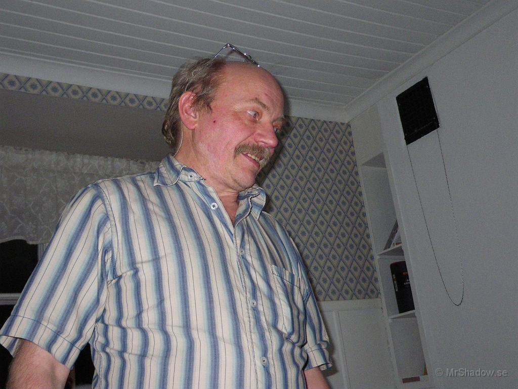 IMGP0125.JPG - Även slåttsägarn ser nöjd ut.